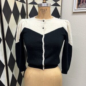 80s does 40s sweater girl piece with gathered sleeves